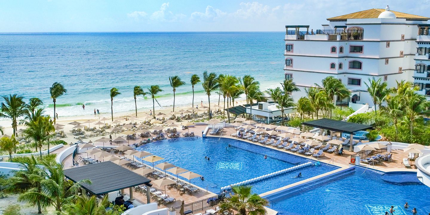 Beachfront resort with large pool and ocean views​